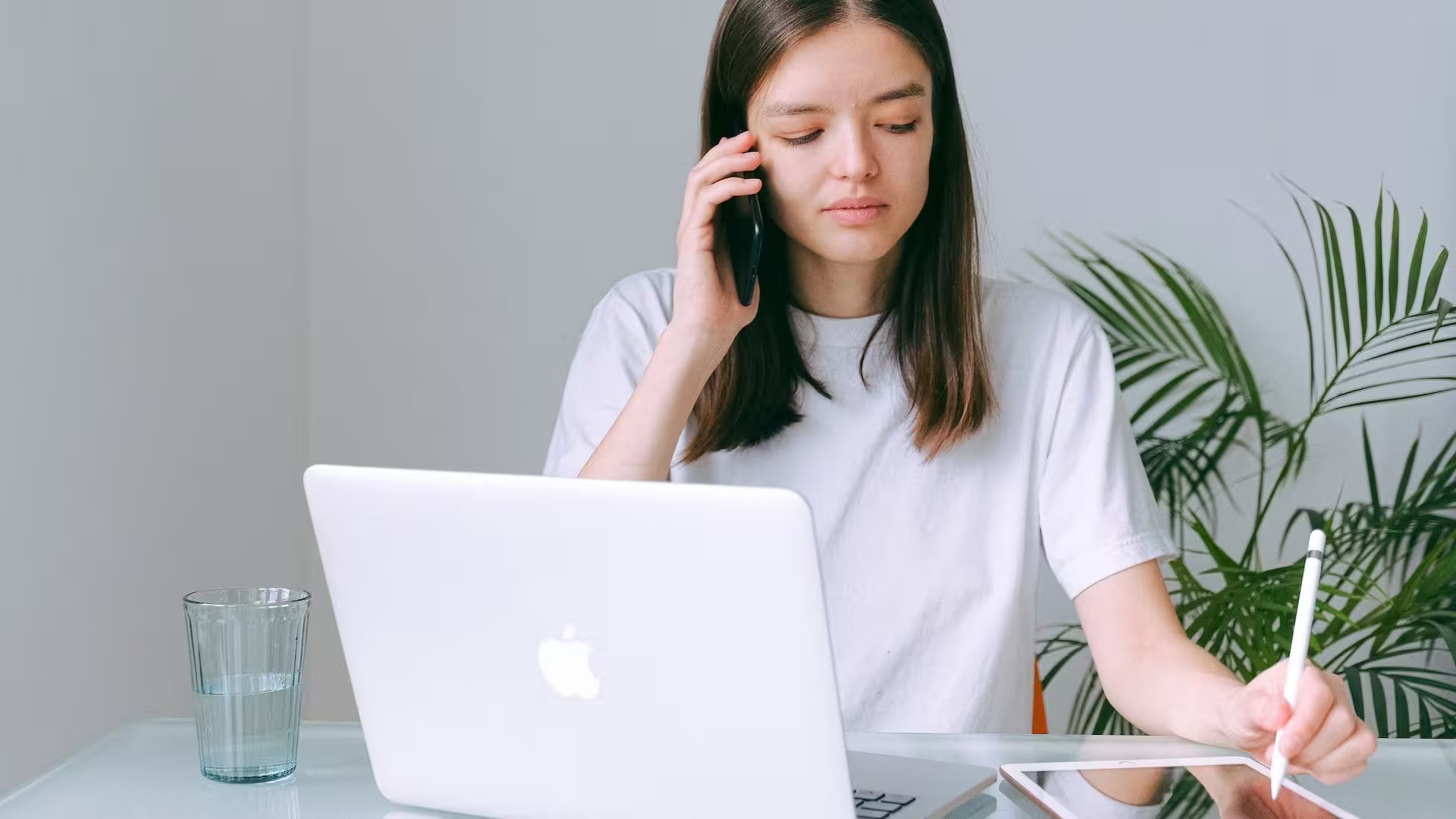 Woman taking a call while working