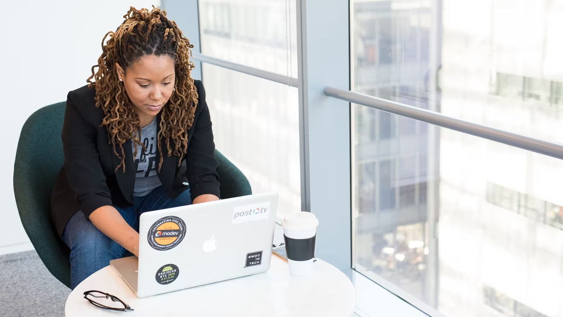 Woman working on Macbook